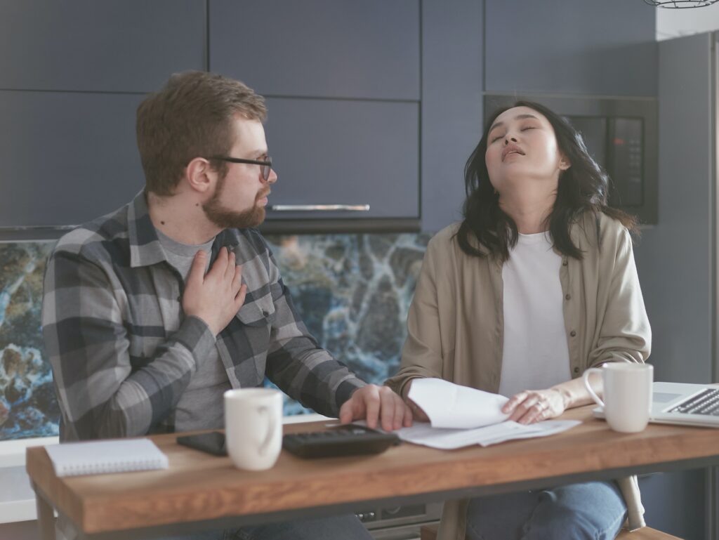 Frustrated woman dealing with her chronic complaining co-worker.