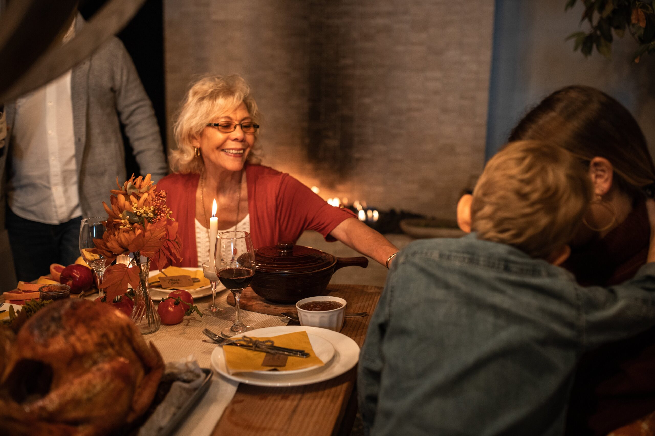 Woman smiling at the table being thankful
